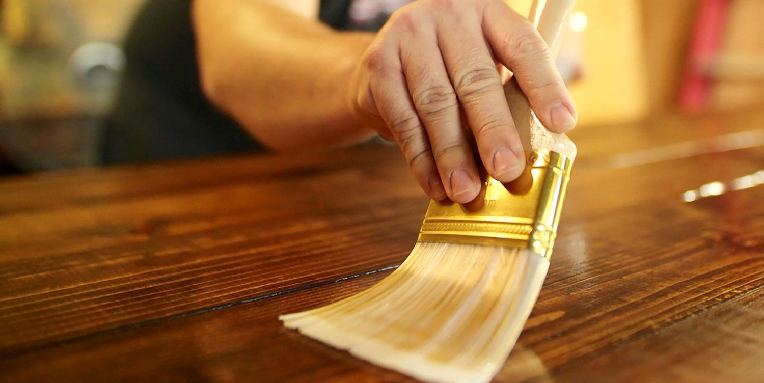 Should I treat or seal wooden garden furniture for hot weather?