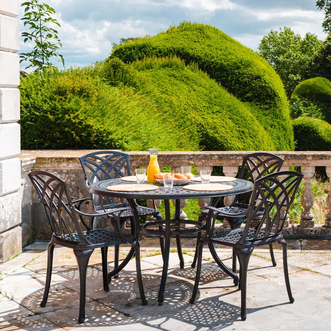 ornate metal garden table and chairs