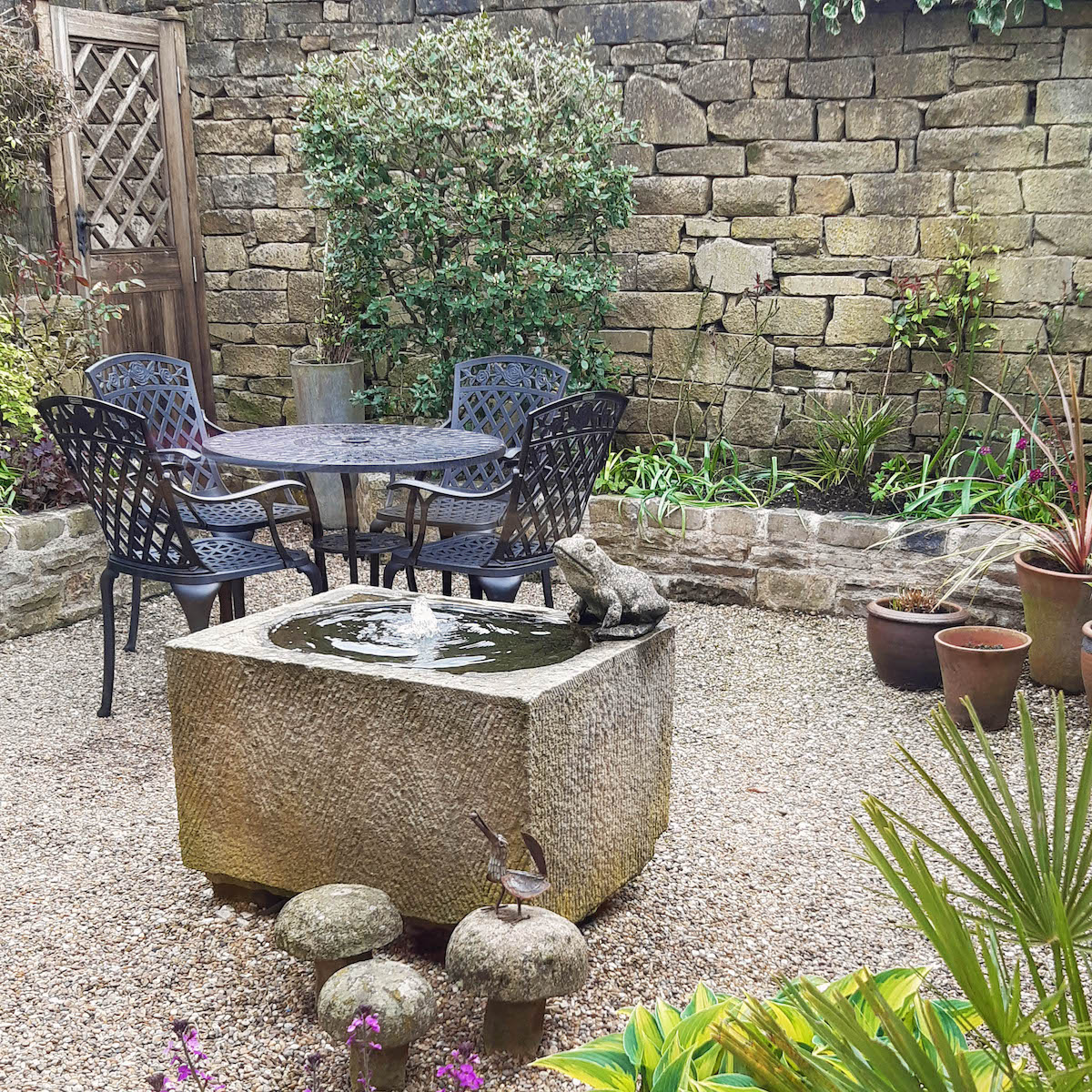 Add a water feature with our Mia Garden Table Set