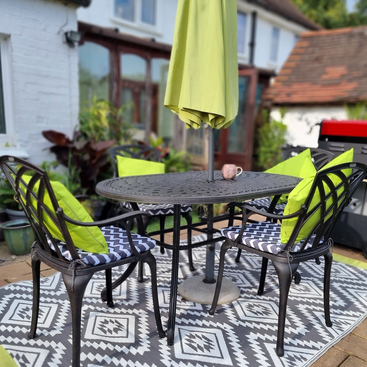 Define your patio seating or dining area with an outdoor rug