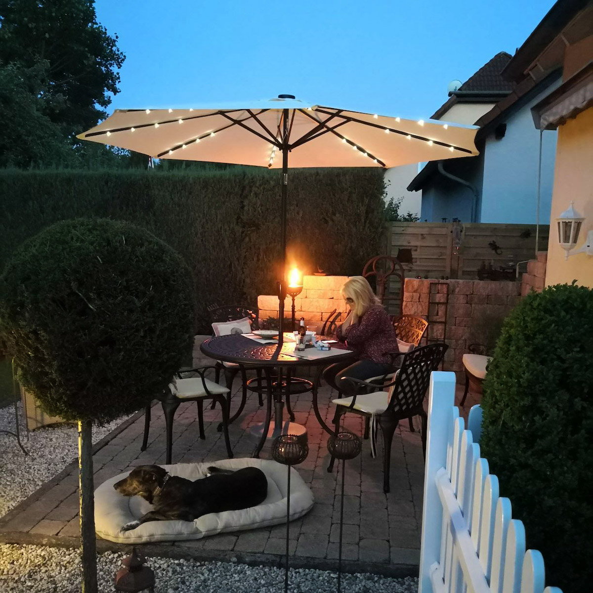 Our top outdoor furniture lighting tips | Fairy Lights in a Lazy Susan Parasol