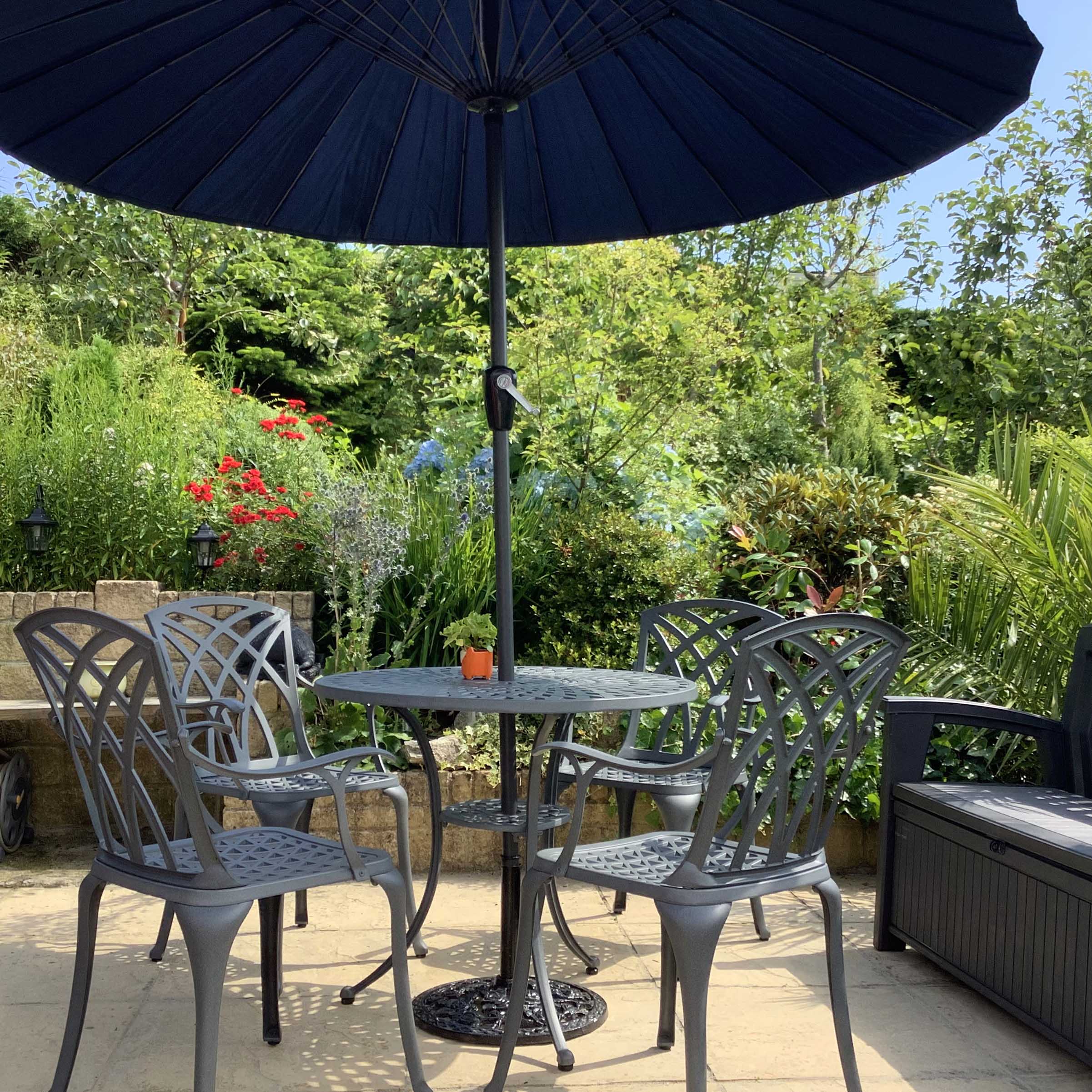 Our Mia Garden Table in Slate look stunning in this country garden