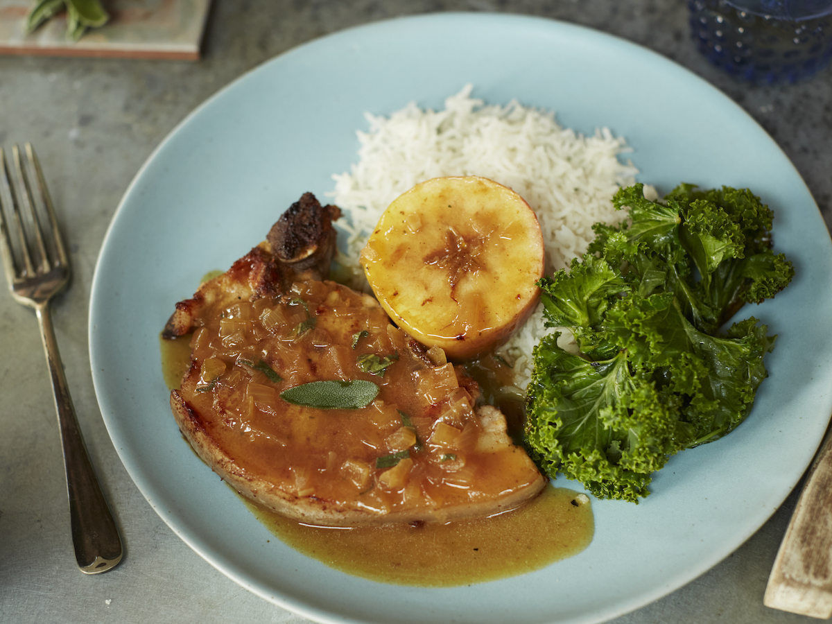 Pork chops with wilted kale, apples and Somerset cider brandy